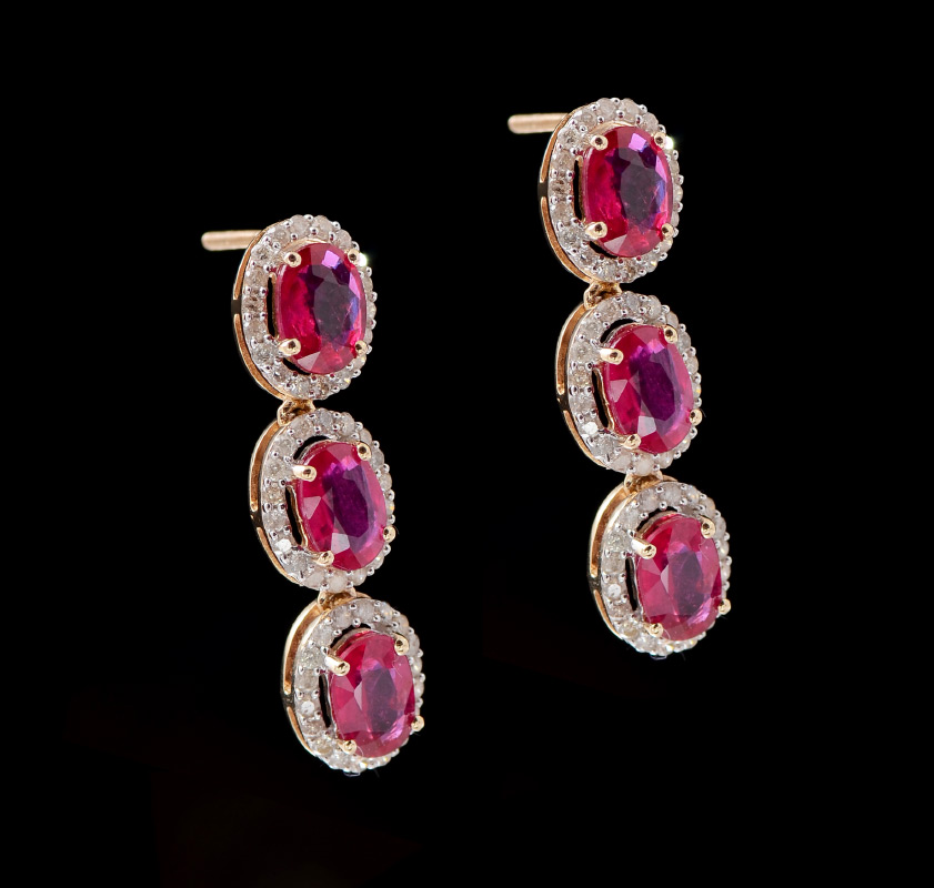 Appraisal: RUBY AND DIAMOND EARRINGS k yellow gold each with a