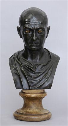 Appraisal: BRONZE BUST OF A ROMAN SENATOR Bald and gazing forward