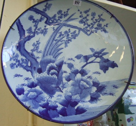 Appraisal: A Japanese blue and white Meiji period charger decorated with