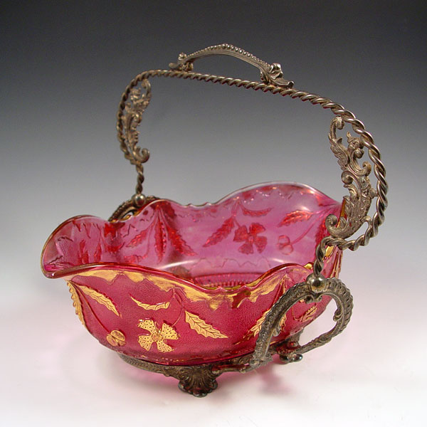 Appraisal: VICTORIAN BRIDES BASKET Flashed cranberry glass in an embossed and