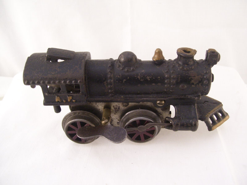 Appraisal: Clockwork Cast Iron Train Engine Original black paint no mark