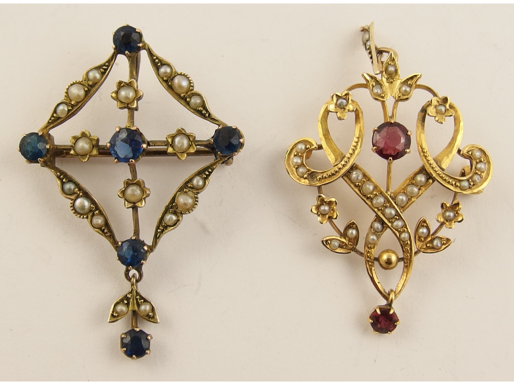 Appraisal: An Edwardian garnet and pearl set pendant brooch together with