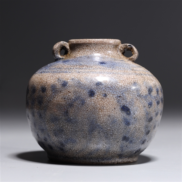 Appraisal: Japanese crackle glazed ceramic jar with molded handles to neck