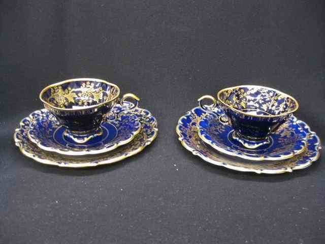 Appraisal: Lindner Bavarian Porcelain Trio Sets cobalt gold cup saucer ''