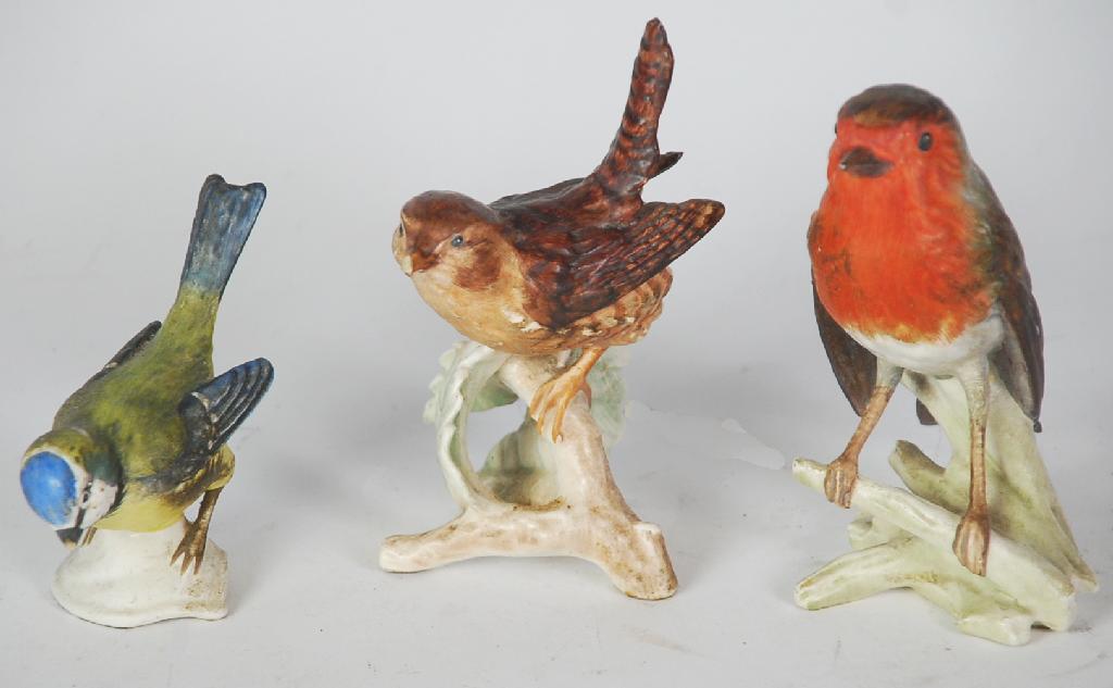 Appraisal: THREE GOEBEL CHINA MODELS OF BIRDS 'Wren' in high beak