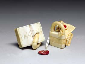 Appraisal: TWO CONTEMPORARY IVORY NETSUKE Two contemporary carved ivory netsuke by