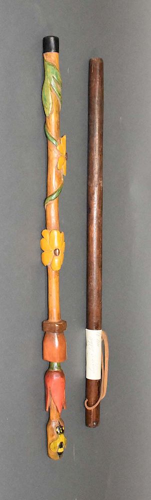 Appraisal: walking sticks walking sticks carved decorated with bee carved flowers