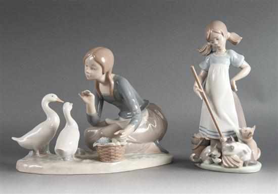 Appraisal: Two Lladro porcelain groups ''Girl with Kittens'' and ''Girl Feeding