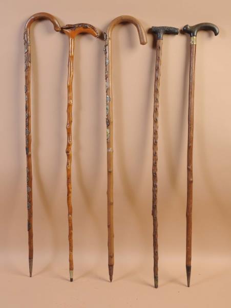 Appraisal: Lot of Canes This lot includes five assorted canes Condition