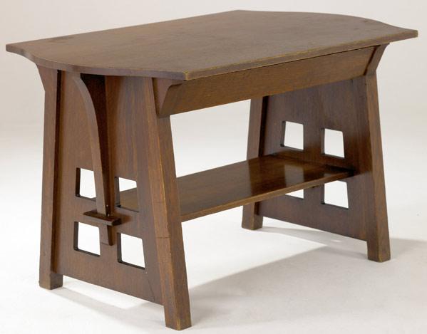 Appraisal: LIMBERT Turtle-top library table with cut-out sides and single blind