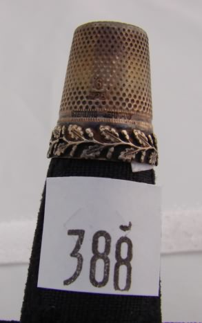 Appraisal: German sterling thimble with leaf design on band