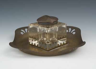 Appraisal: An Arts Crafts Metal and Glass Inkwell The heavy glass