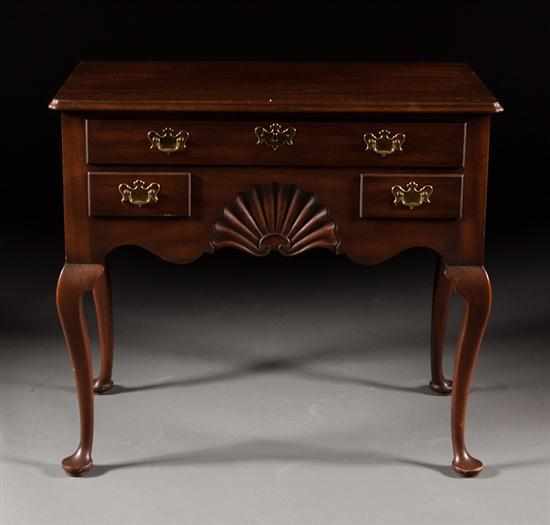 Appraisal: Kittinger Queen Anne style mahogany lowboy shell carving on pad