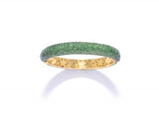 Appraisal: A RUSSIAN TSAVORITE BANGLE WITH K BLACKENED GOLD A RUSSIAN