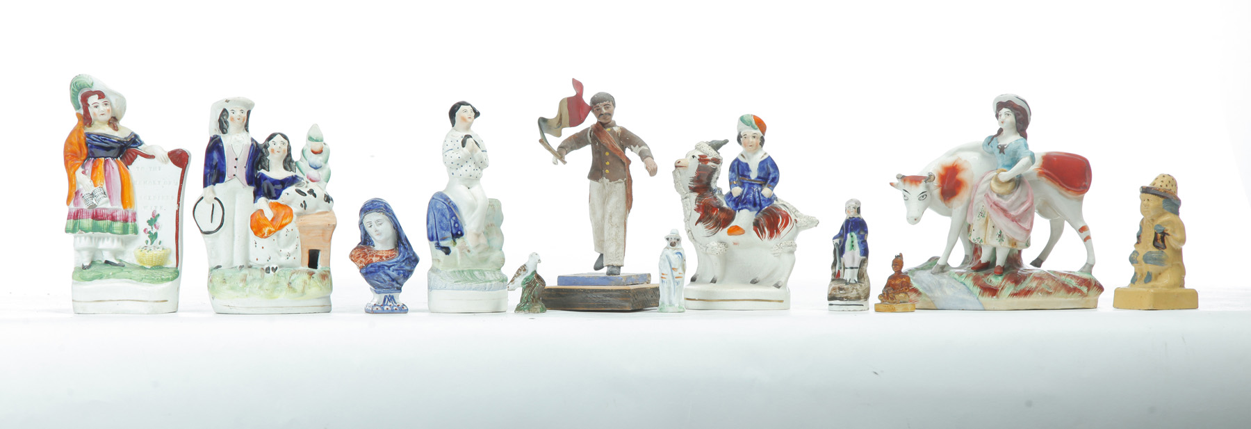 Appraisal: GROUP OF CERAMIC FIGURES INCLUDING STAFFORDSHIRE Nineteenth- th century Animals