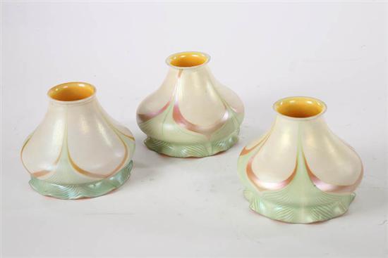 Appraisal: THREE ART GLASS LAMP SHADES All with similar Pulled Feather