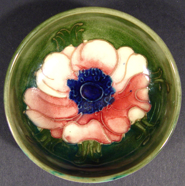 Appraisal: Moorcroft pottery pin dish hand painted and tubelined with an