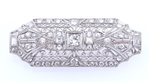 Appraisal: Art Deco pt and diamond filigree panel brooch ornately pierced