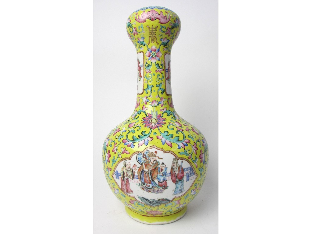 Appraisal: A Chinese yellow ground baluster vase painted with two ogival