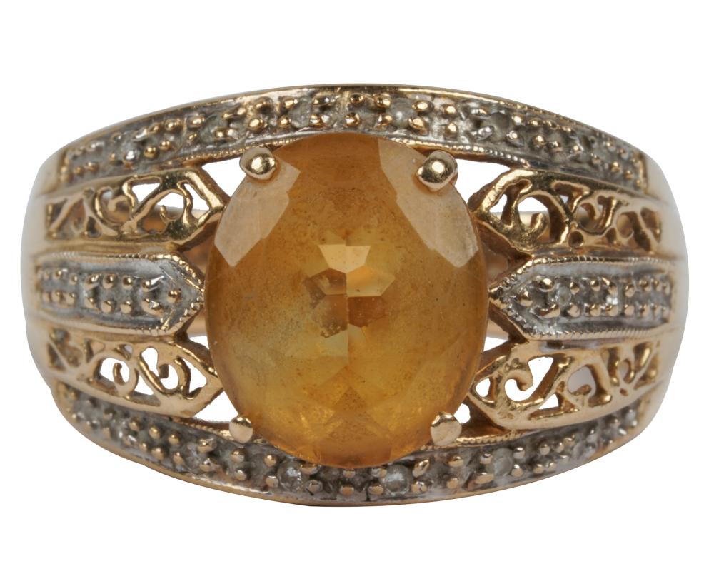 Appraisal: KARAT GOLD CITRINE RINGcentering one oval mixed cut citrine weighing