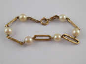 Appraisal: A yellow metal tests carat gold and cultured pearl bracelet