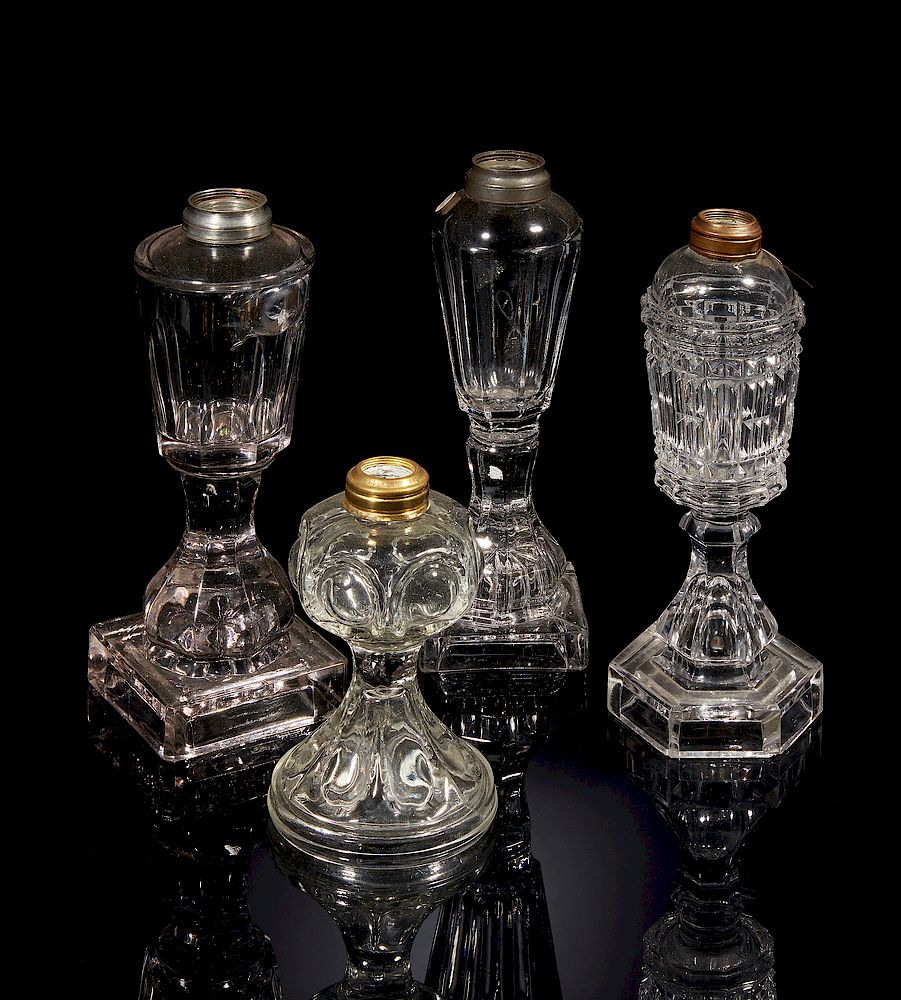 Appraisal: Four Glass Oil Lamps Four assorted glass oil lamps missing