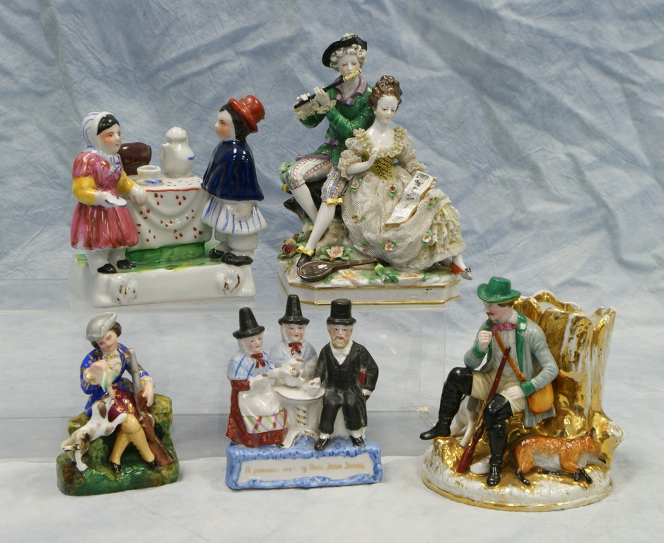 Appraisal: Continental porcelain figural groups one with musician couple blue under