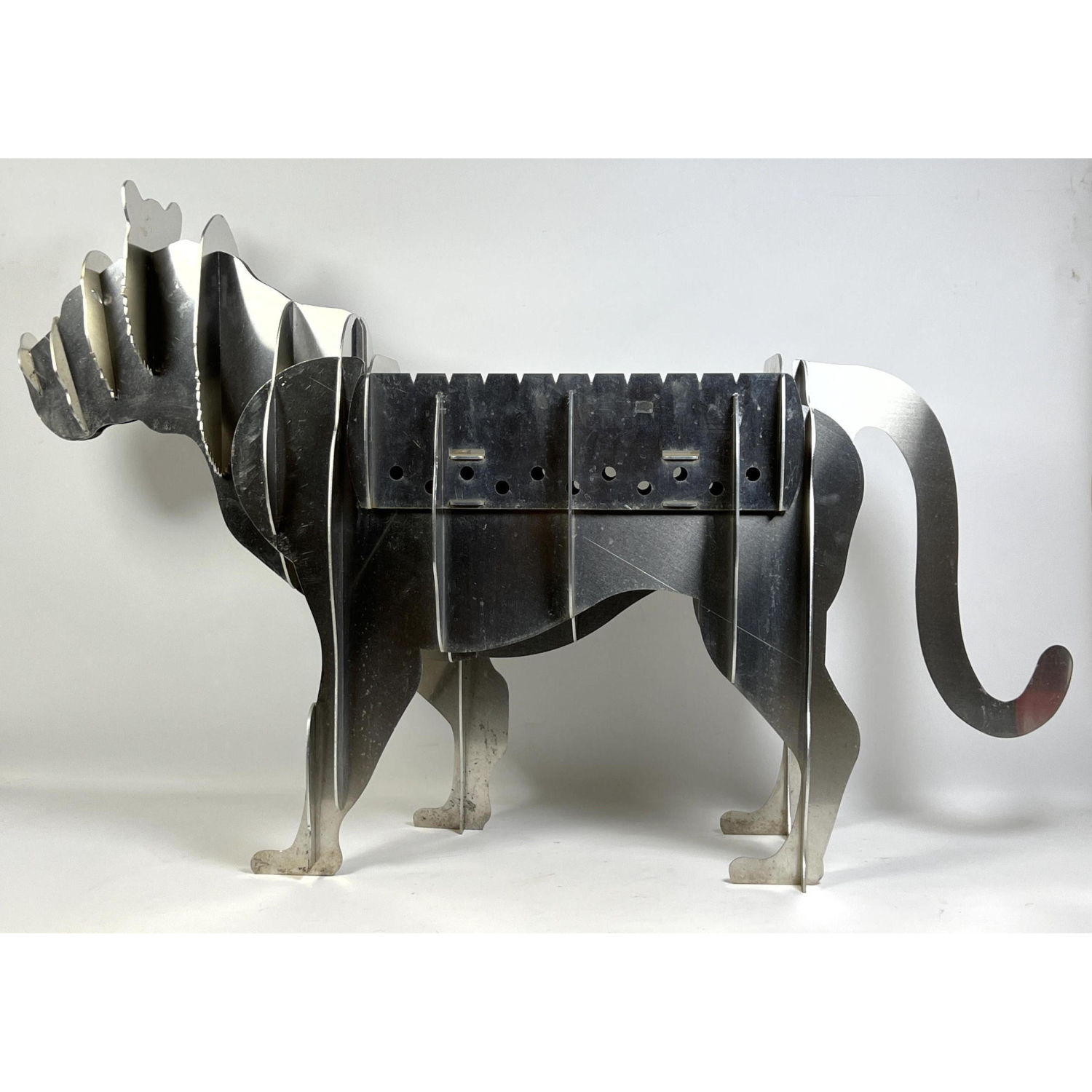 Appraisal: Decorator Layered Aluminum Sculpture of Lion Lift out tray could