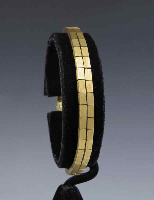 Appraisal: K GOLD BRACELET yellow gold Two strands of rectangular links