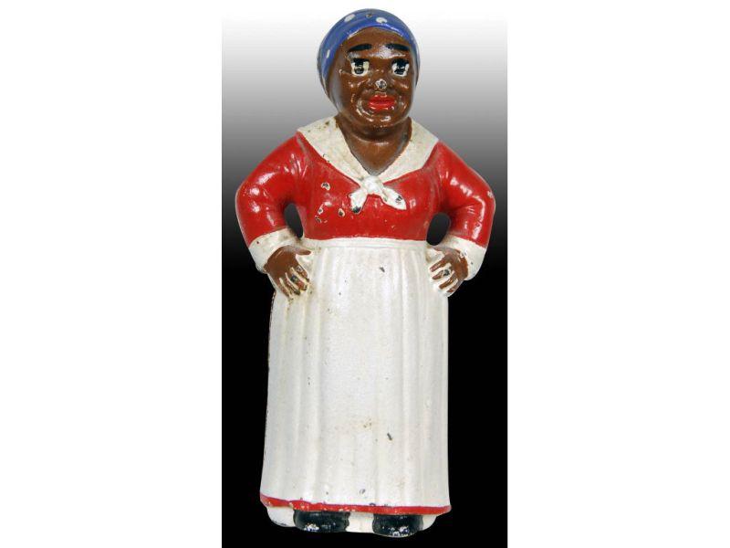 Appraisal: Cast Iron Mammy with Hands on Hips Still Bank Description