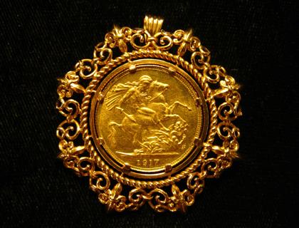 Appraisal: karat yellow gold coin brooch gold coin prong set into