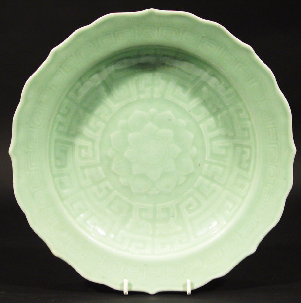 Appraisal: Chinese celadon glazed plate incised with Greek key decoration and