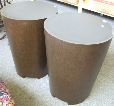 Appraisal: A pair of patinated metal drums or jardiniere display stands