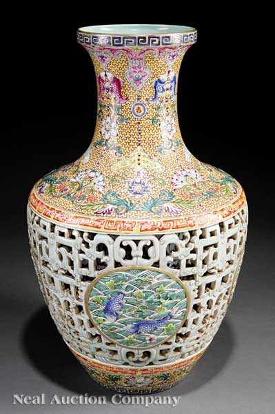 Appraisal: A Chinese Reticulated Famille Rose Porcelain Double Vase Qianlong mark