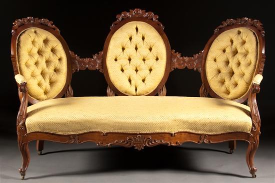 Appraisal: Rococo Revival carved walnut button-back upholstered sofa circa in H