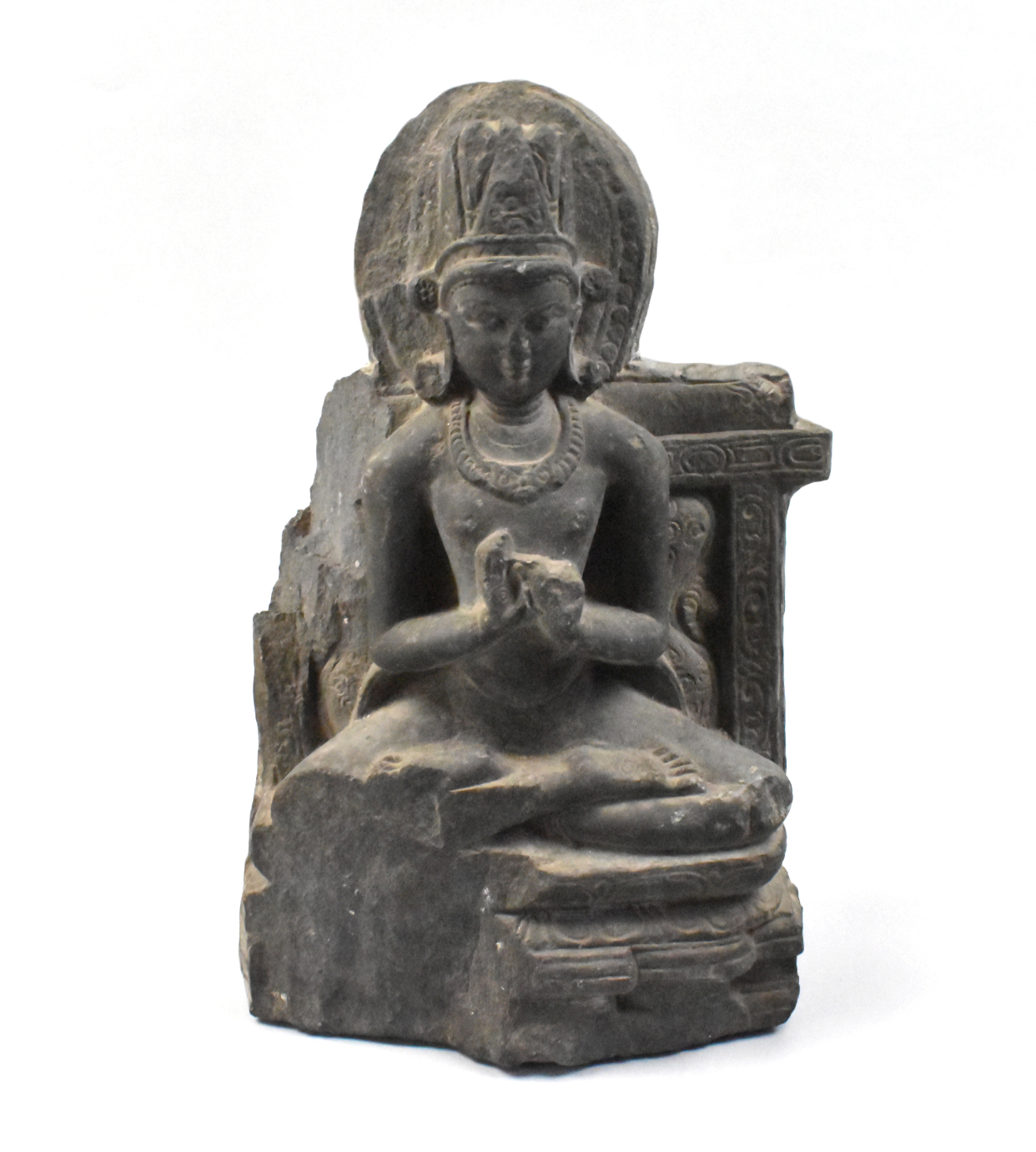 Appraisal: An antique Gandhara seated figurine carved out of stone dated