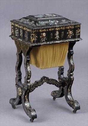 Appraisal: VICTORIAN MOTHER-OF-PEARL INLAID PAPIER MACHE SEWING TABLE The hinged scalloped