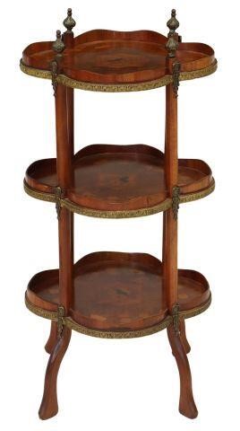 Appraisal: French mahogany quatrefoil-form stand th c three tiers with floral