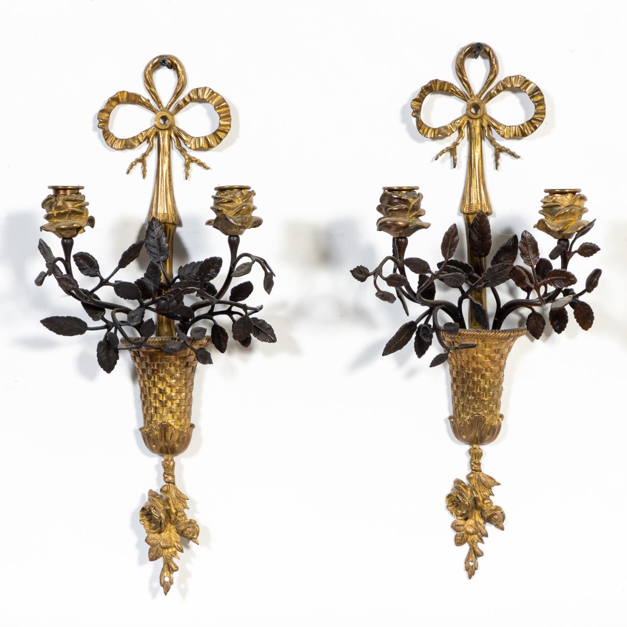 Appraisal: PR LOUIS XVI STYLE TWO-LIGHT FLORAL SCONCES Likely French pair