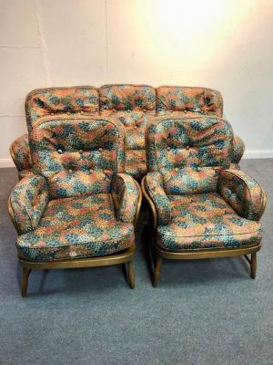 Appraisal: An Ercol sofa and two matching chairs circa with upholstered