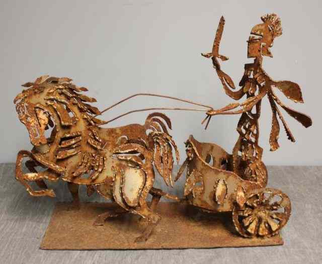 Appraisal: Midcentury Iron Brutalist Sculpture of a Figurein a Chariot From