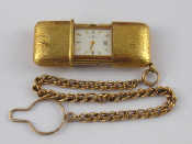 Appraisal: A gilt metal self winding Movado purse watch in Movado