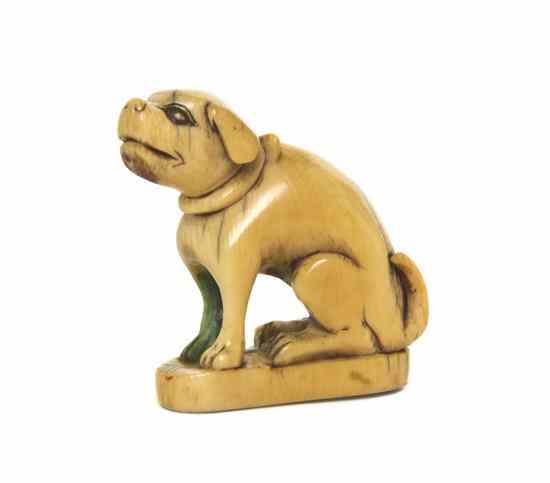 Appraisal: An Ivory Dog Netsuke depicted seated on its haunches with