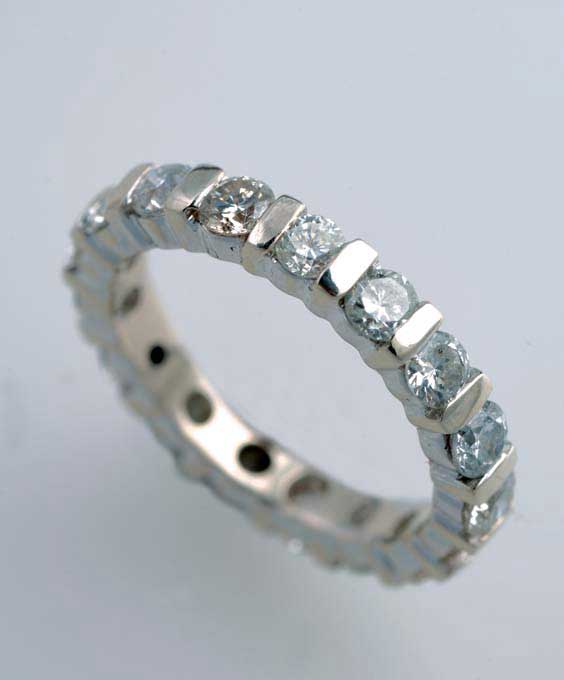 Appraisal: DIAMOND AND WHITE GOLD BAND Delicate and slim diamond and