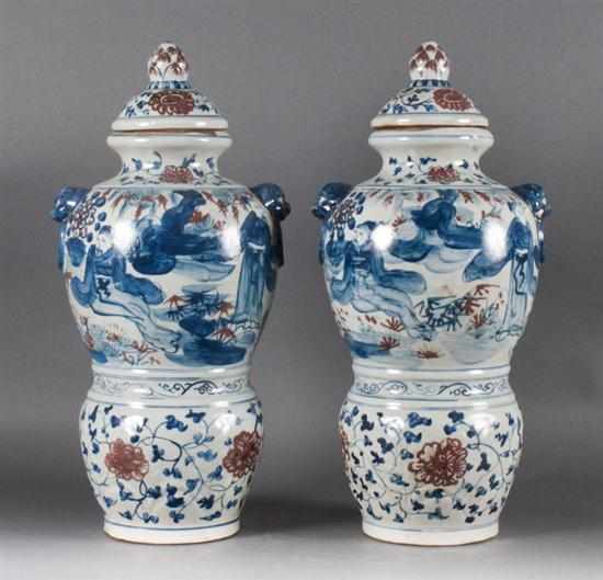 Appraisal: Pair of Chinese blue and white and rouge-de-fer porcelain urns