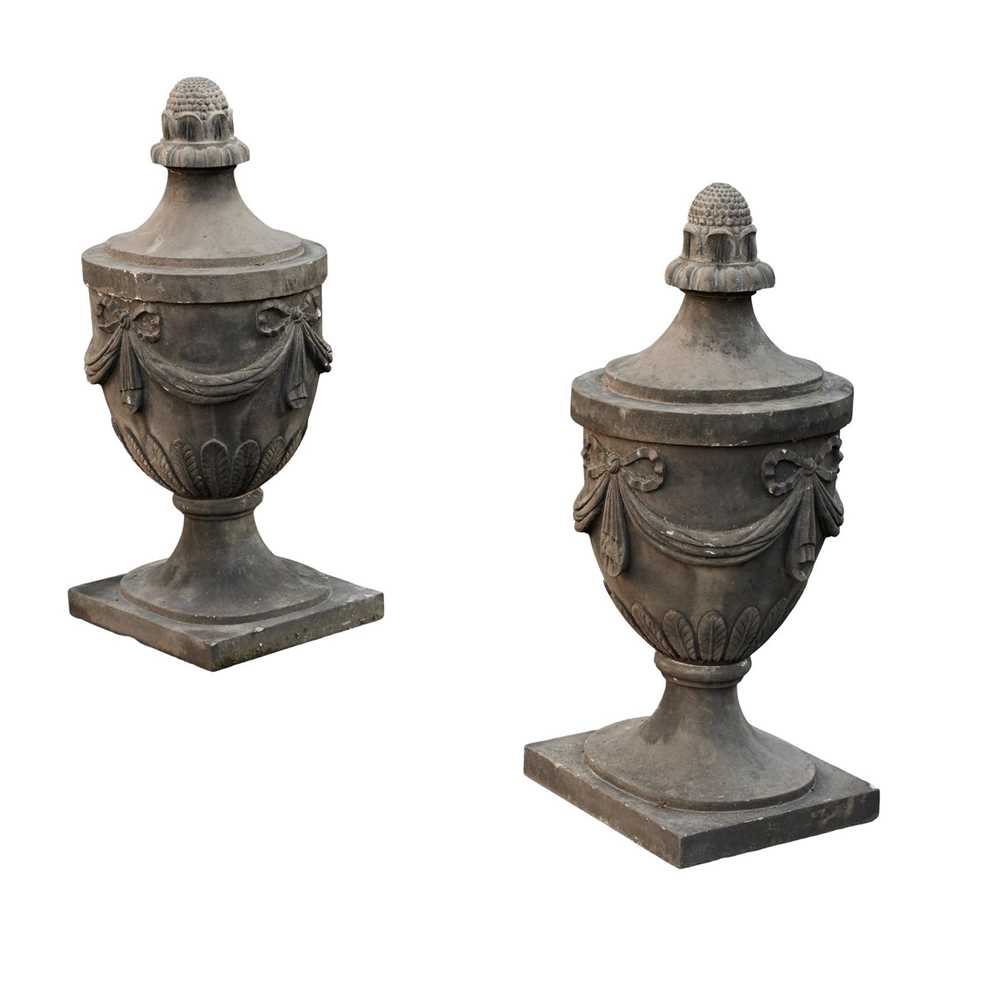 Appraisal: PAIR OF CARVED SANDSTONE ADAM STYLE URNS TH CENTURY the