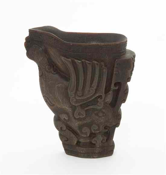 Appraisal: A Horn Carved Libation Cup having a key-fret band to