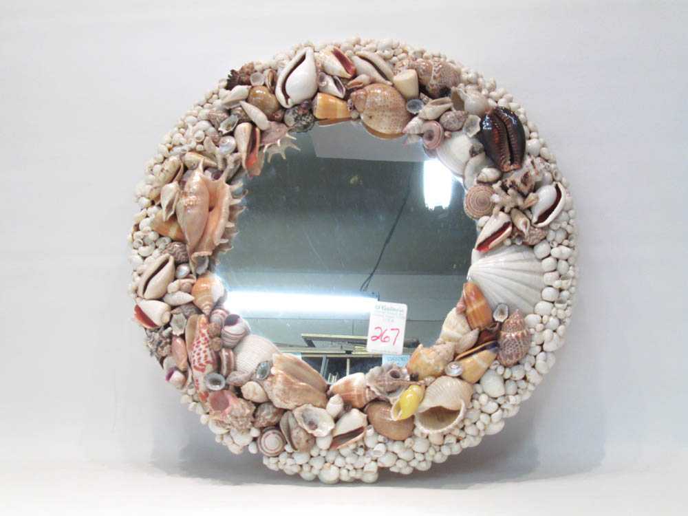 Appraisal: SEASHELL FRAMED WALL MIRROR of circular form including a variety