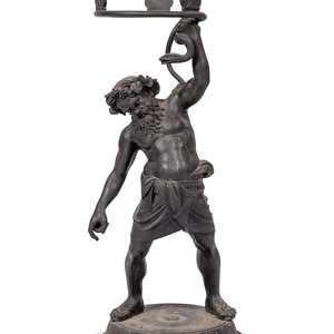 Appraisal: A Grand Tour Bronze Figure of Silenus Wrestling a Serpent