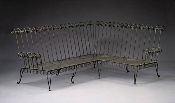 Appraisal: A Neoclassical style iron corner garden bench The angled back